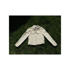White cotton jacket. Stylish shape.